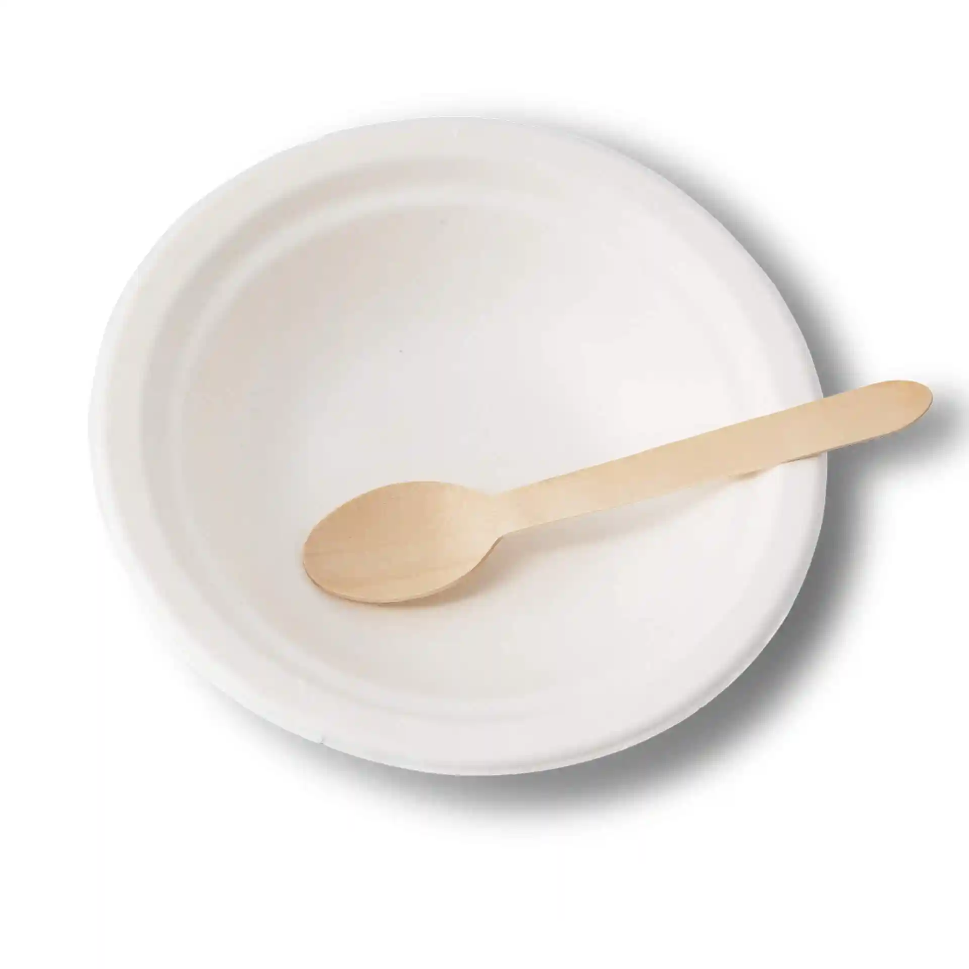 Bol rond blanc en canne à sucre avec une cuillère en bois à l'intérieur, pouvant contenir 400 ml de nourriture.