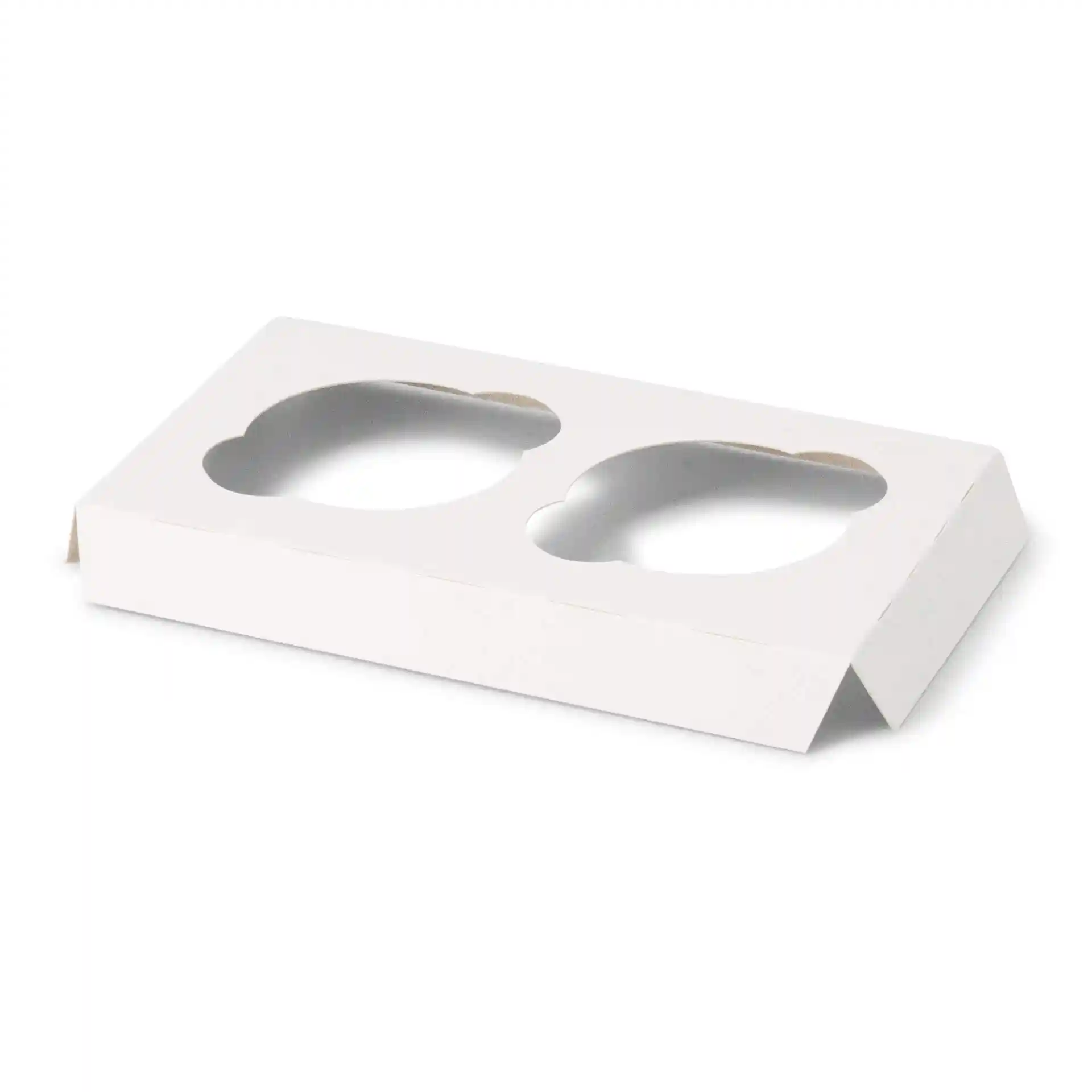 Insert en carton blanc avec deux découpes circulaires pour des cupcakes.