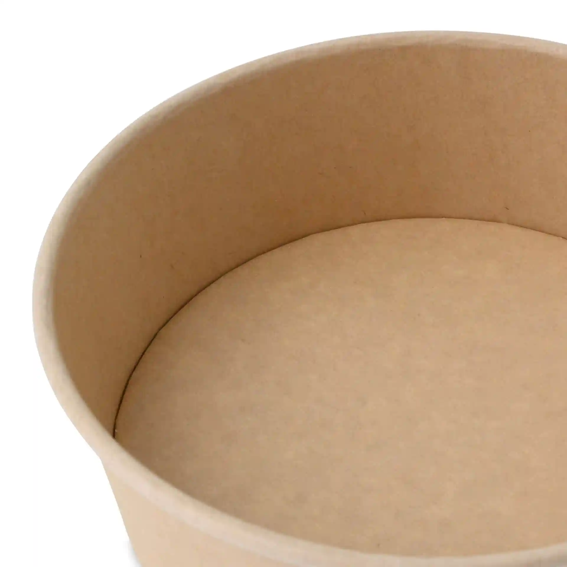 Bol en papier brun rond en carton, montrant l'intérieur avec une surface lisse.
