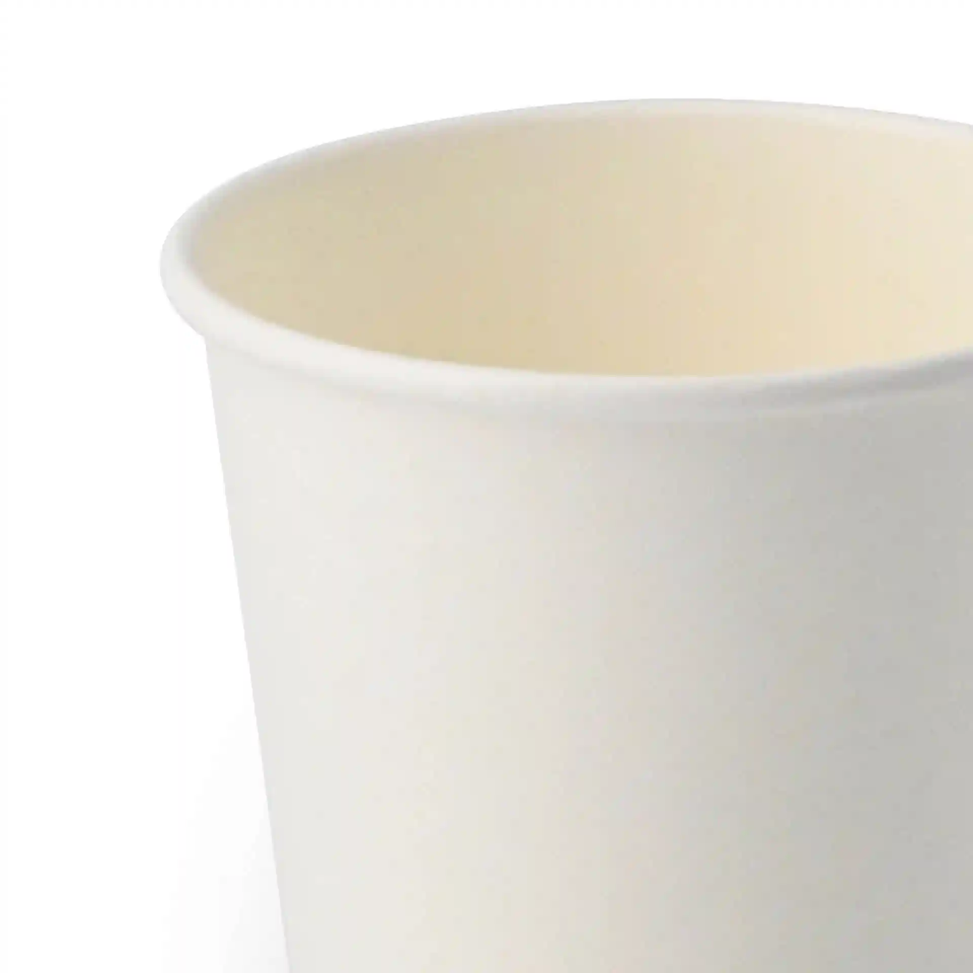 Tub de crème glacée en papier blanc de forme ronde, montrant le bord supérieur et la surface intérieure.