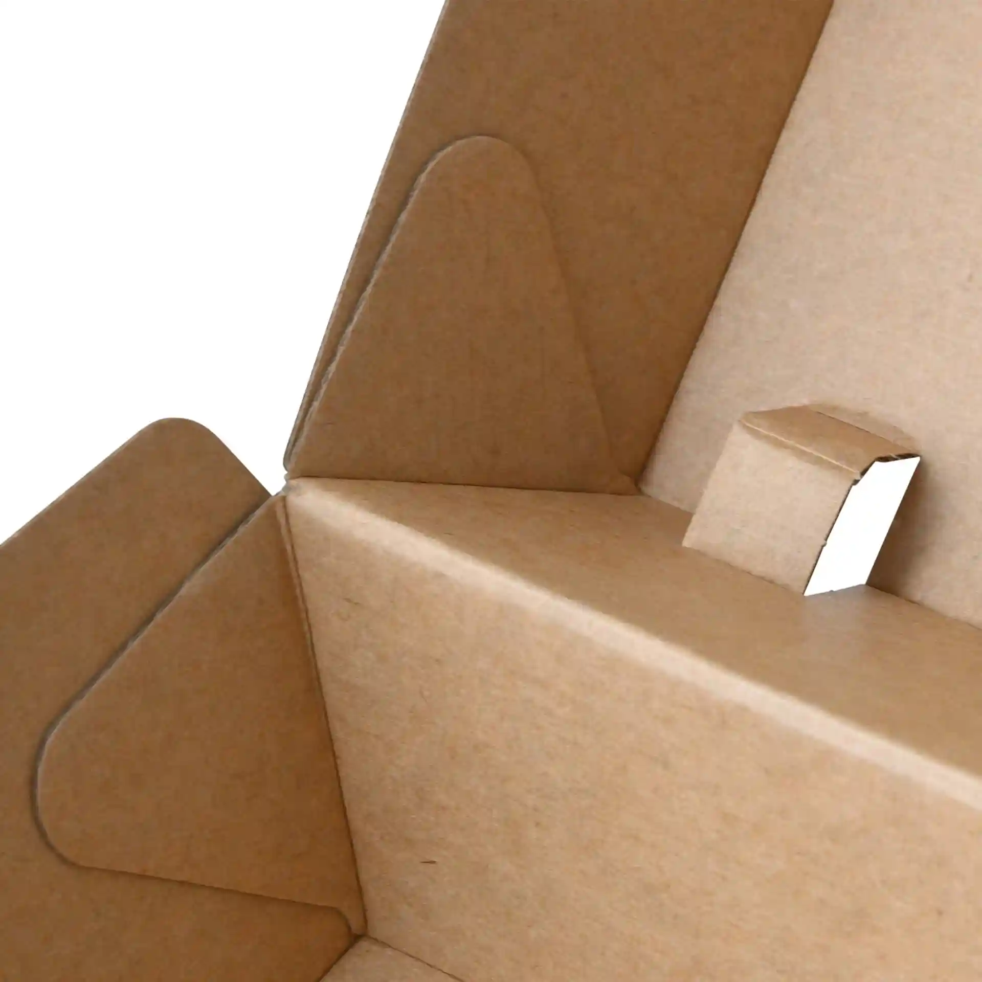 Gros plan d'une boîte à burger en carton kraft montrant les coins intérieurs et les rabats.