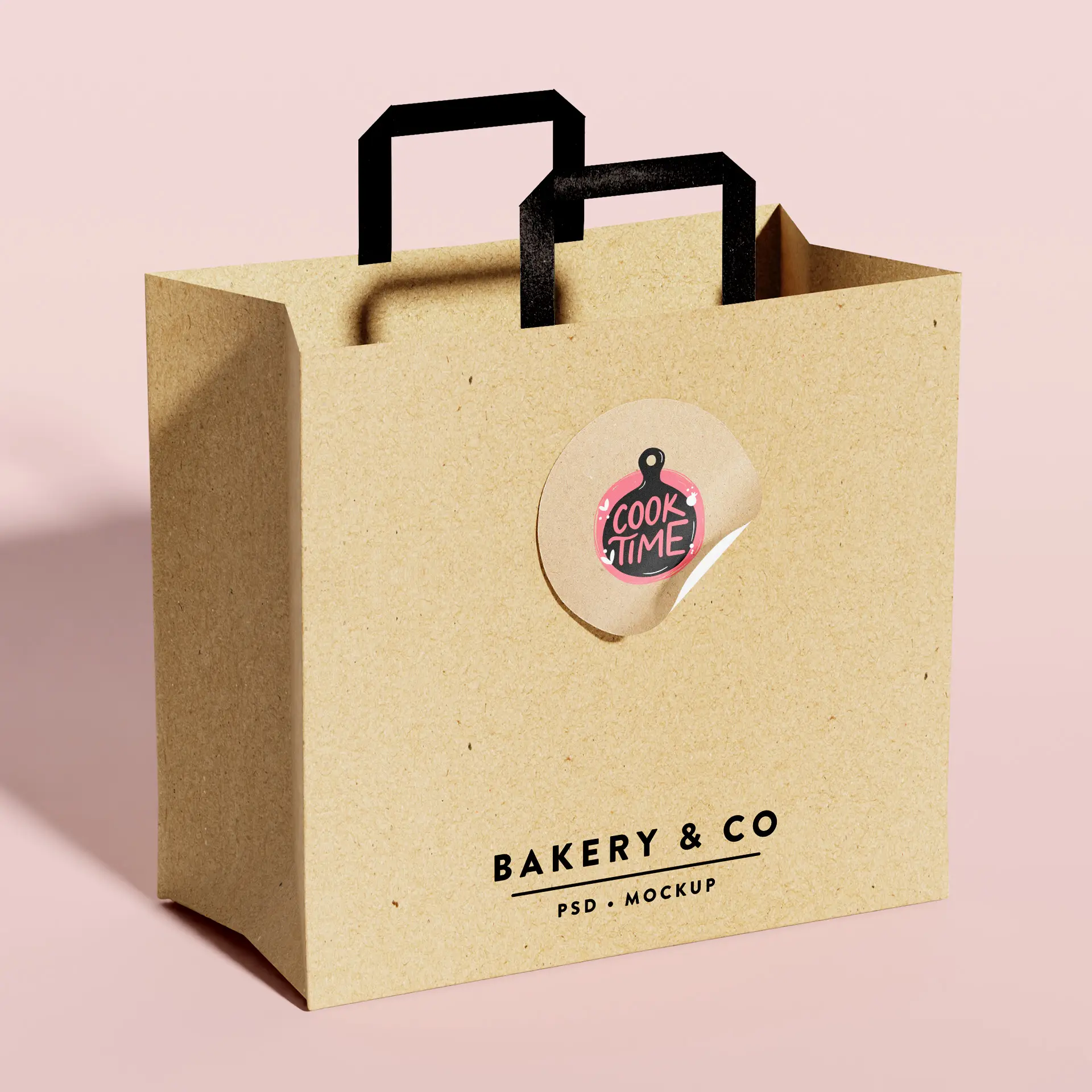 Sac en papier kraft marron avec poignées noires, étiquette circulaire indiquant "Cook Time" et nom de marque "Bakery & Co."