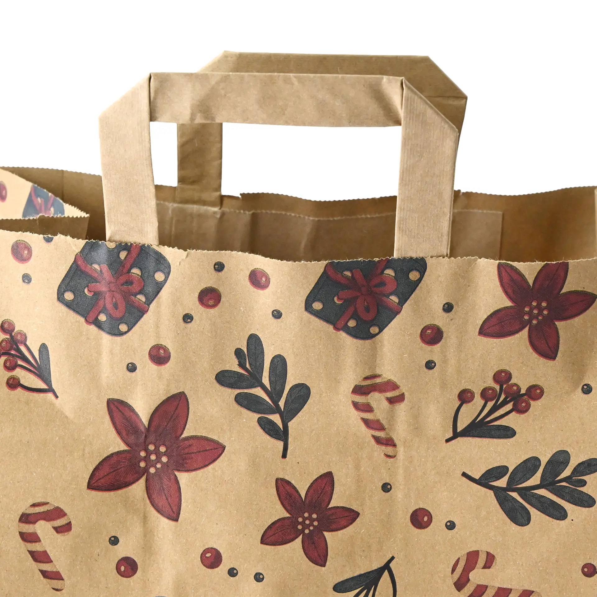 Sac en papier brun avec design d'hiver, motifs floraux et cannes en sucre, dimensions 26 x 17 x 25 cm.