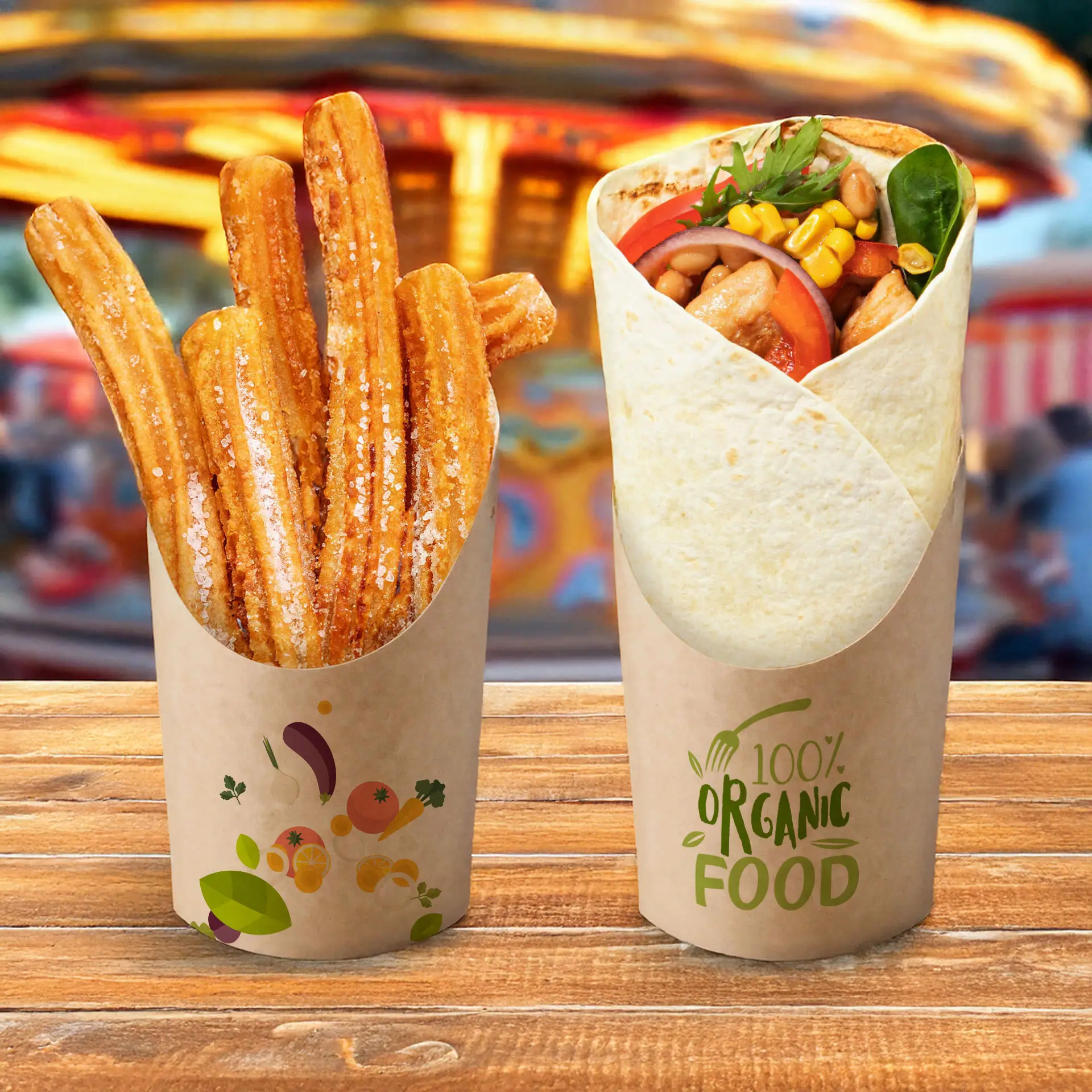 Churros dans un gobelet en papier kraft à côté d'un wrap rempli d'ingrédients bio dans un gobelet personnalisé sur une table en bois.