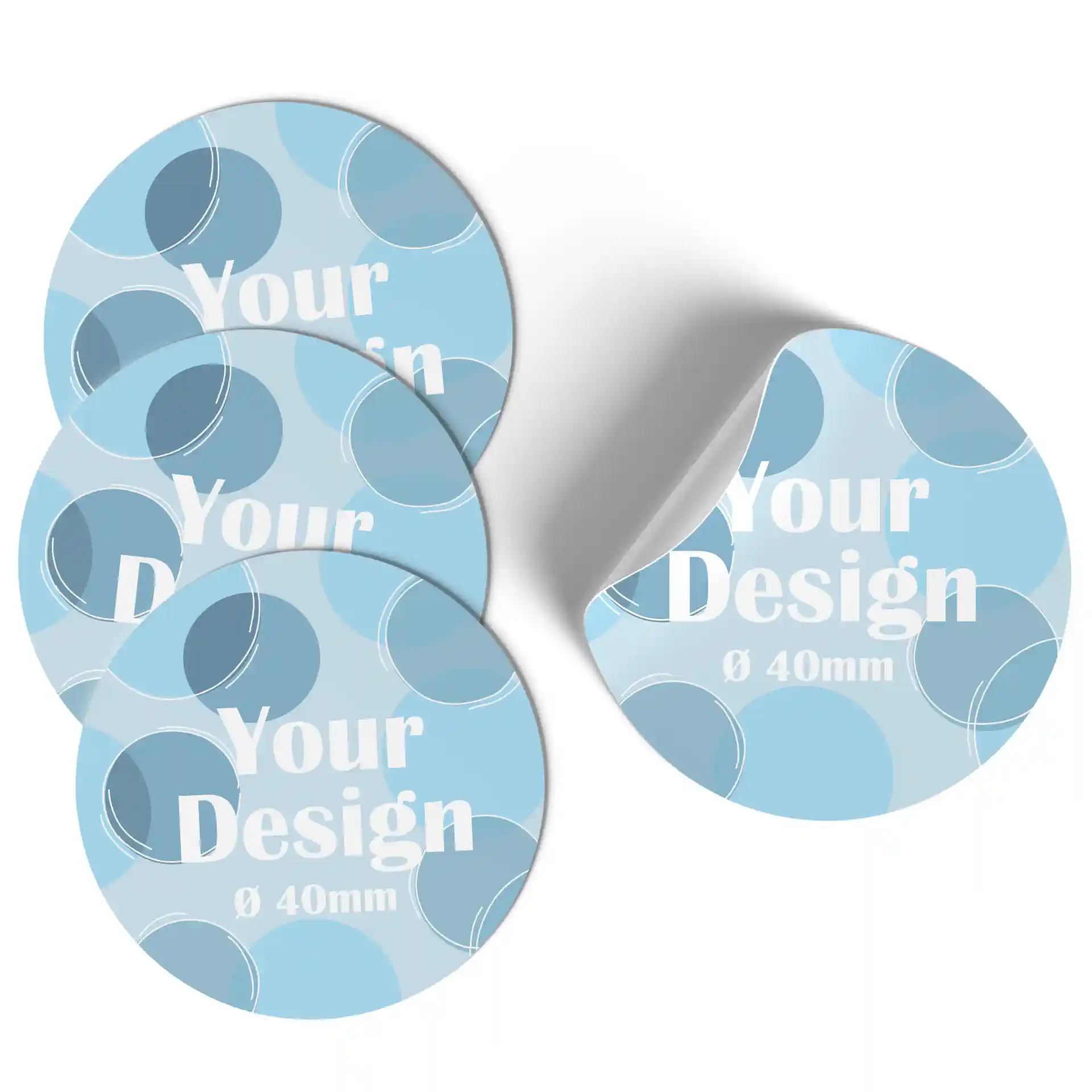 Étiquettes rondes imprimées en tons de bleu avec texte blanc, mesurant 40 mm de diamètre, présentant un léger repli sur un bord.