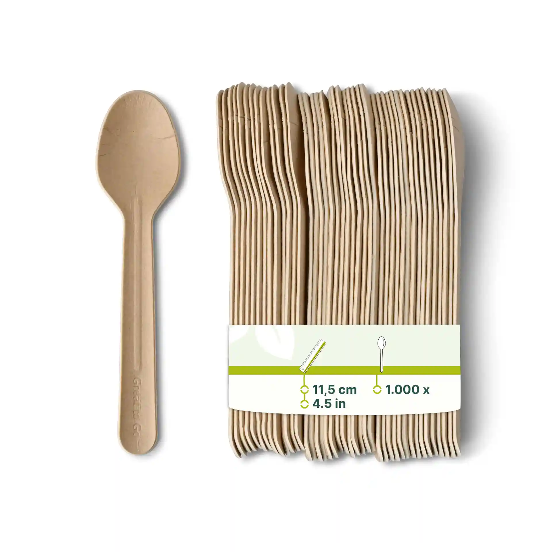 Cuillère en papier brun de 11,5 cm, avec une étiquette montrant les détails du produit et plusieurs cuillères empilées derrière.