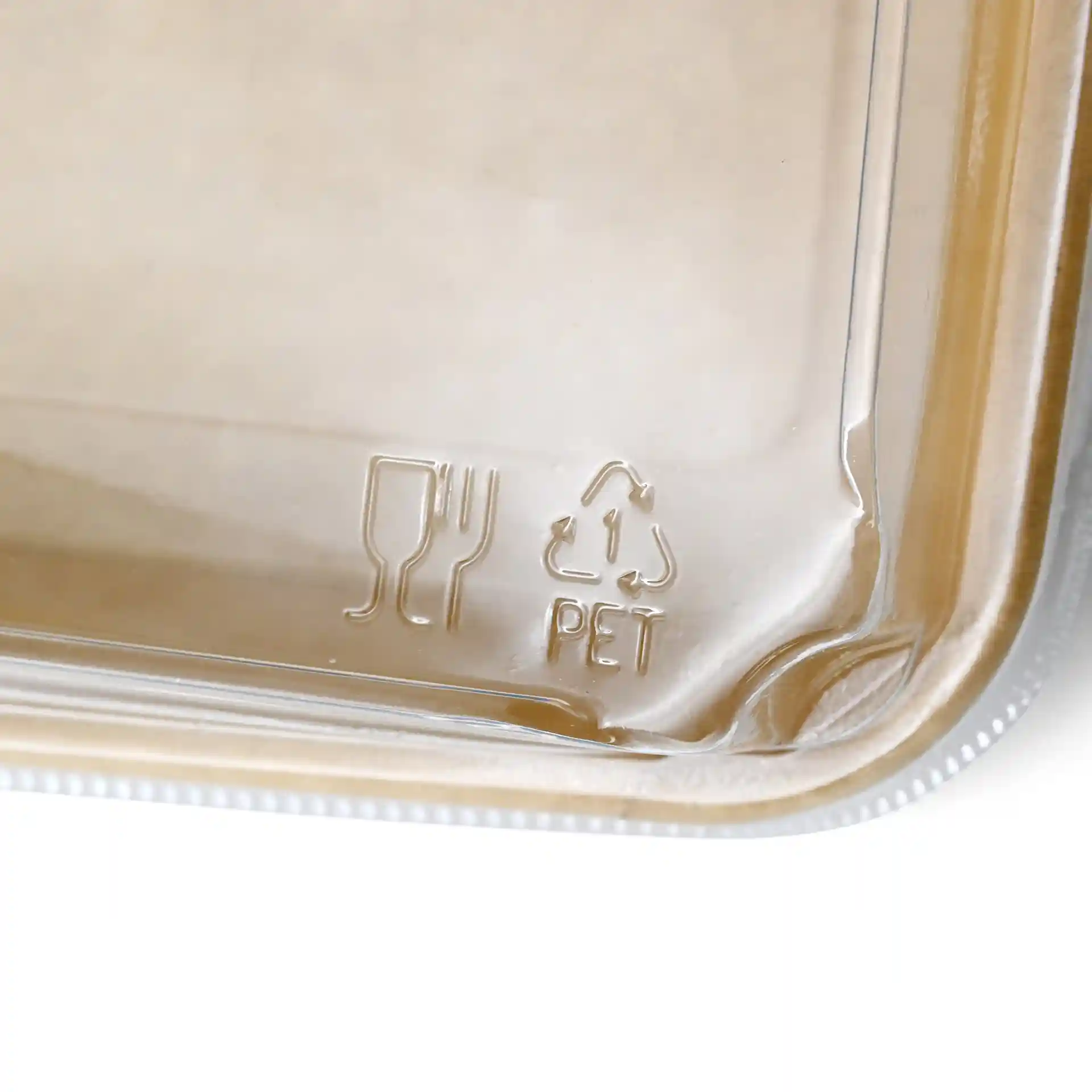 Couvercle transparent en PET pour boîtes à sushi, avec un symbole de fourchette et de verre, et un symbole de recyclage avec 'PET'.