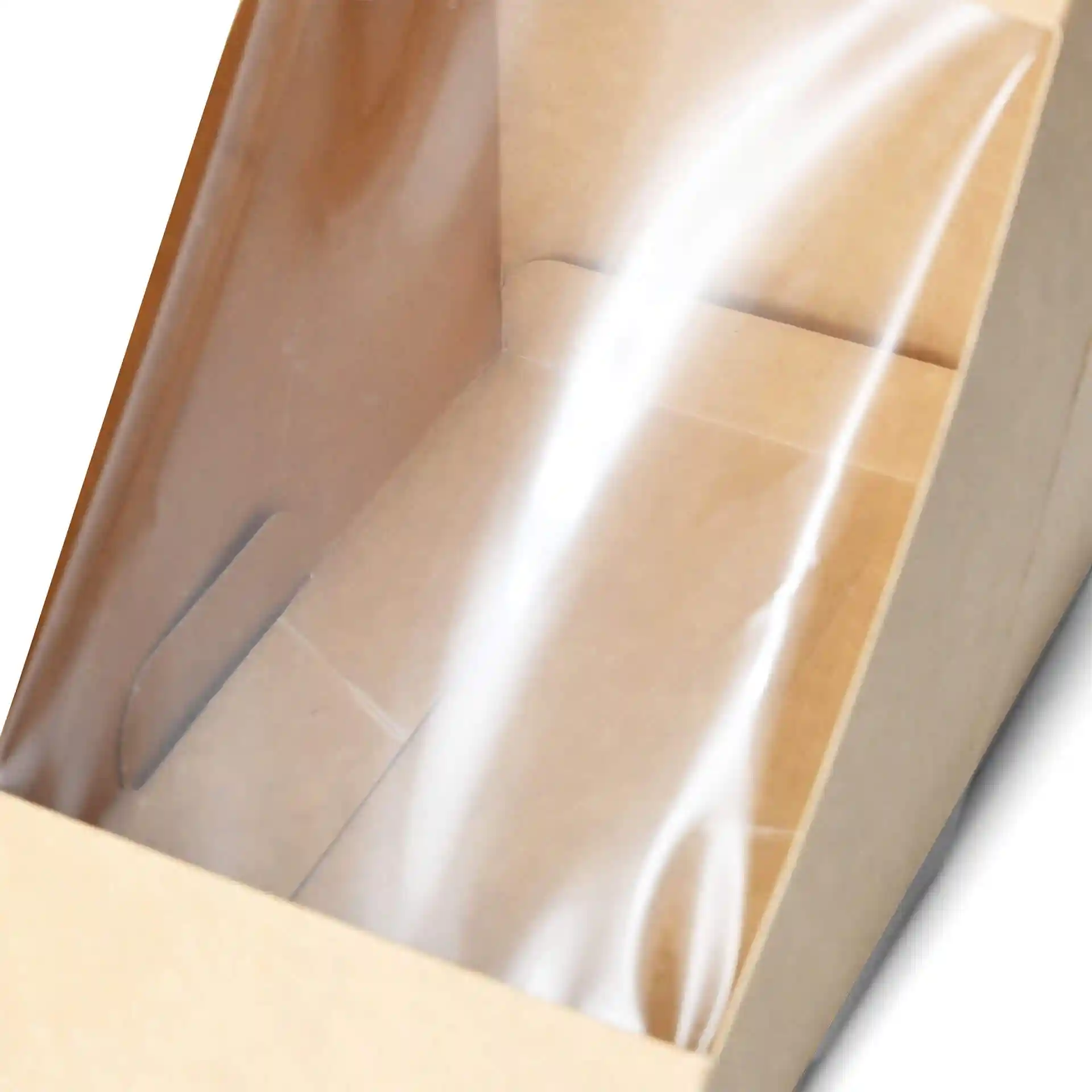 Boîte triangulaire en carton pour sandwich avec une fenêtre PLA transparente, montrant l'intérieur et le matériau brun.