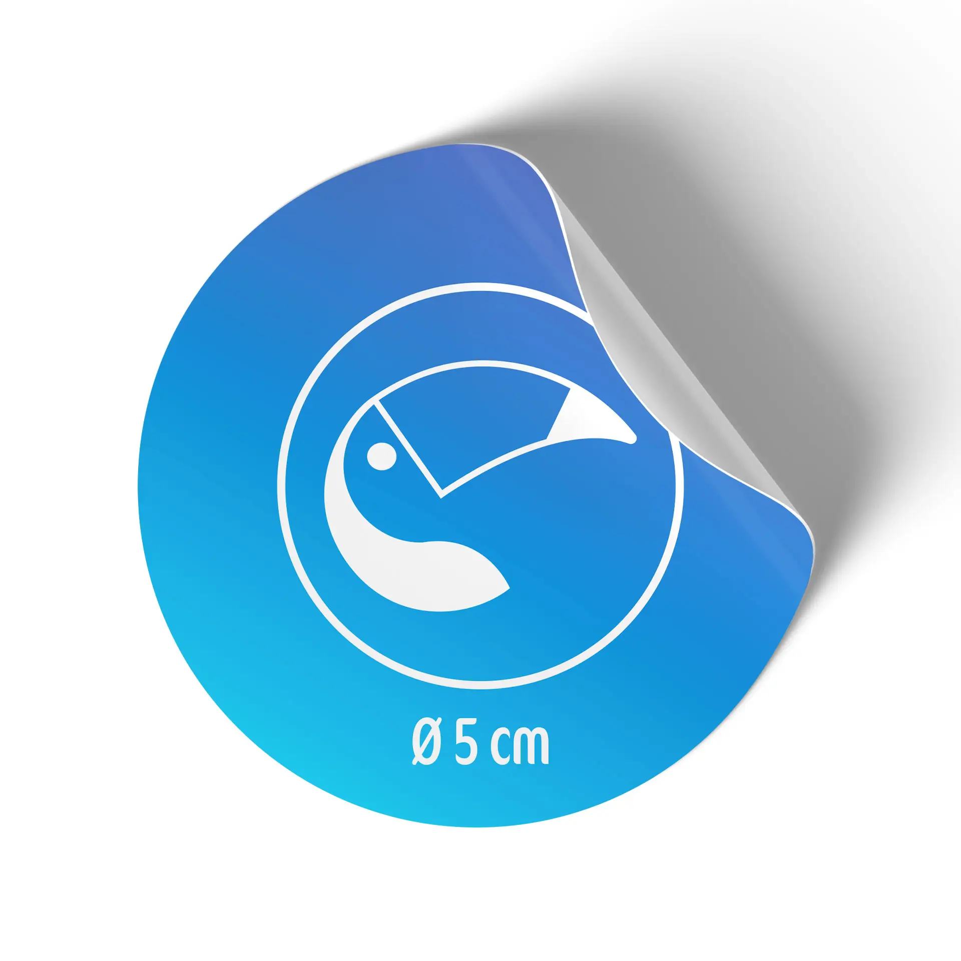 Étiquette ronde brillante, diamètre de 5 cm, présentant un design graphique blanc sur fond bleu, avec un coin qui se soulève.