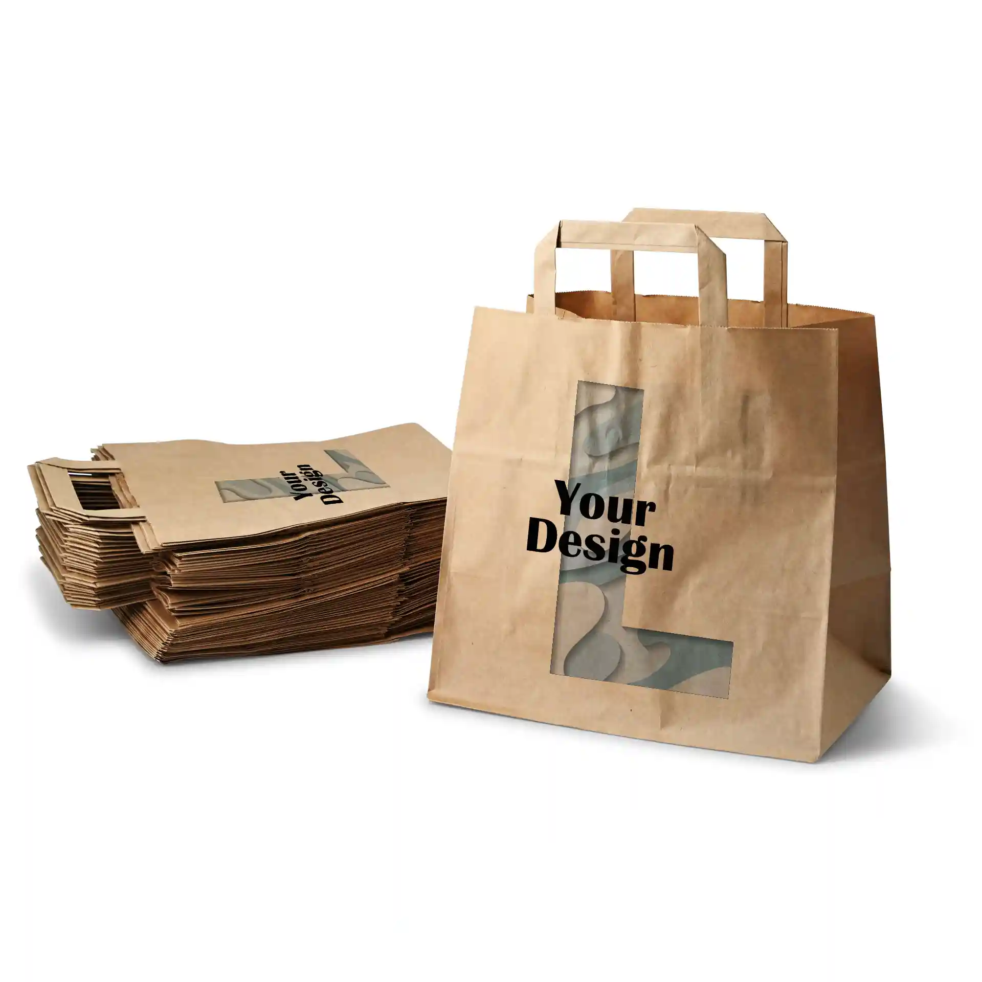 Sac en papier brun de forme rectangulaire, avec une zone de design et des sacs empilés en arrière-plan.