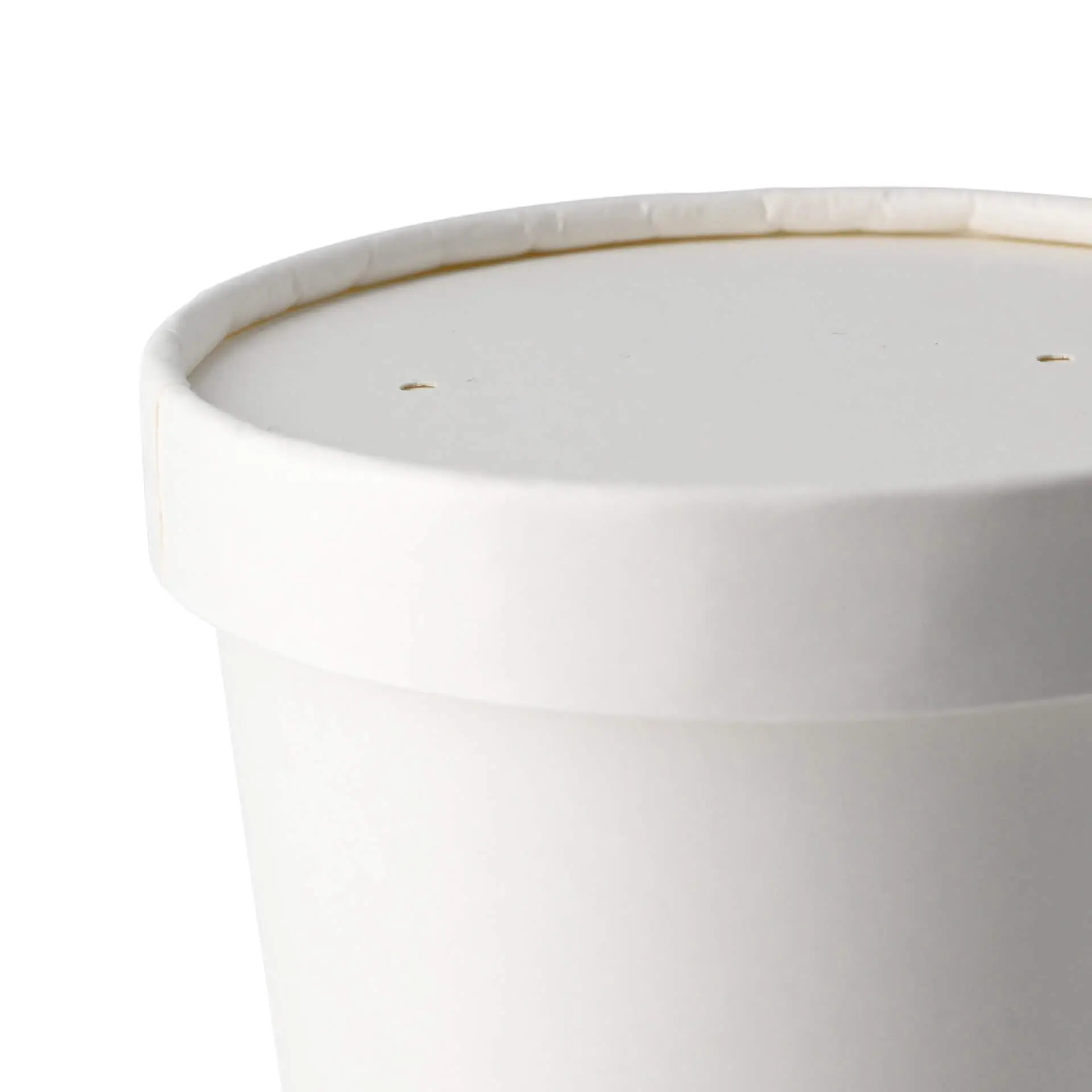 Couvercle en carton blanc d'un diamètre de 100 mm et d'une hauteur de 17 mm, avec deux petits trous sur le dessus.