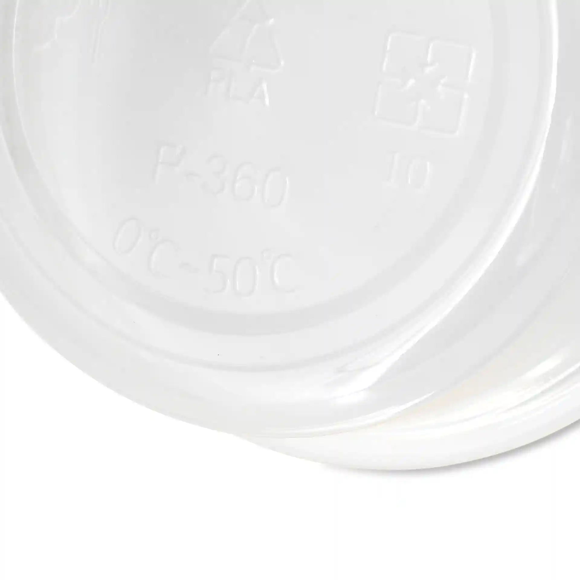 Conteneur rond transparent de 121 mm de diamètre et 50 mm de hauteur, montrant des marquages au fond.