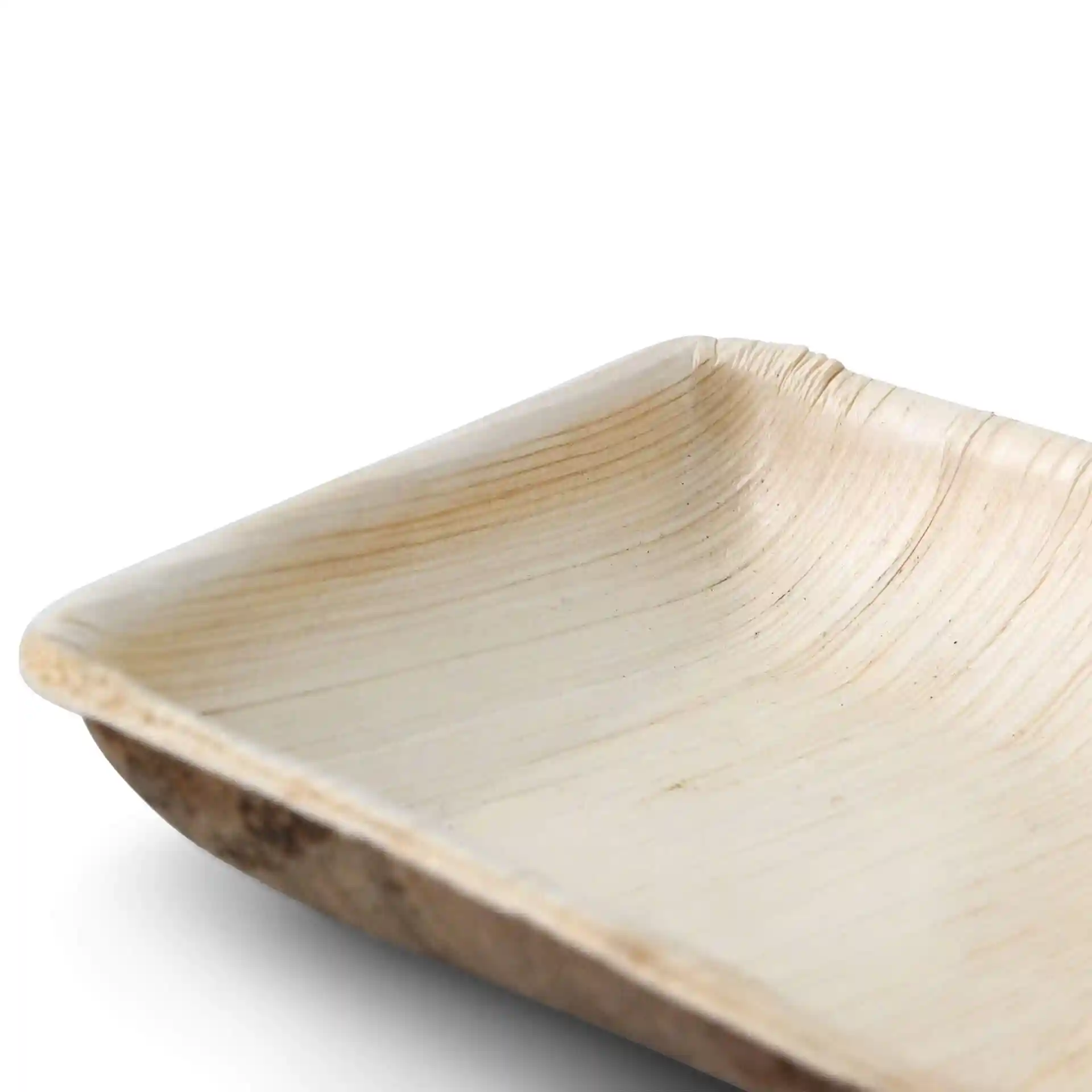 Bol carré en feuille de palmier avec une texture grainée, montrant un design profond et sans revêtement.