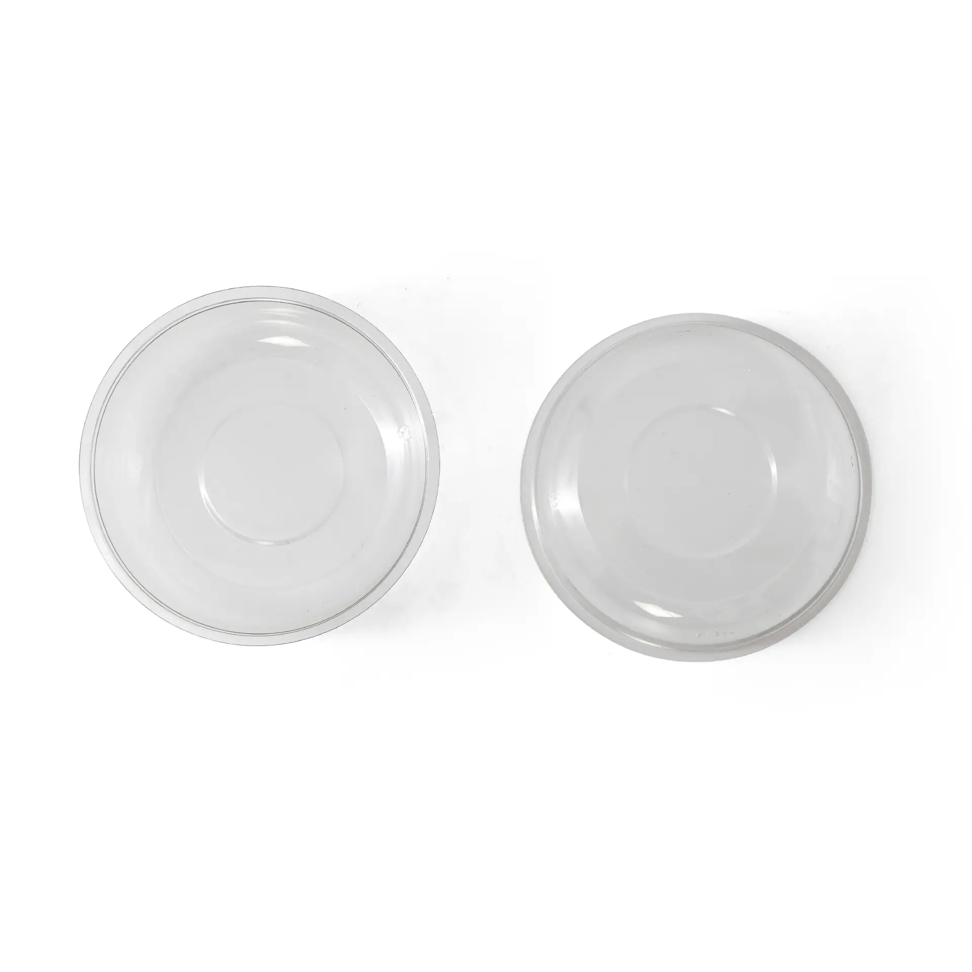 Deux insertions transparentes en PET, chacune d'un diamètre de 95 mm et d'une capacité de 130 ml, conçues pour la séparation des aliments.