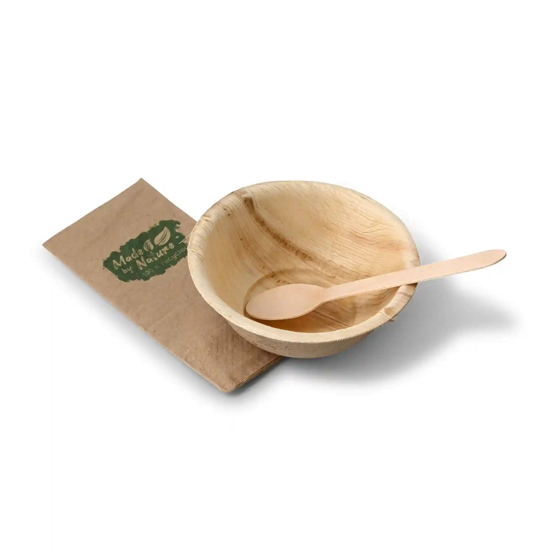 Bol rond en feuille de palmier avec une cuillère en bois et une manche en papier kraft. Bol avec texture et capacité de 275 ml.