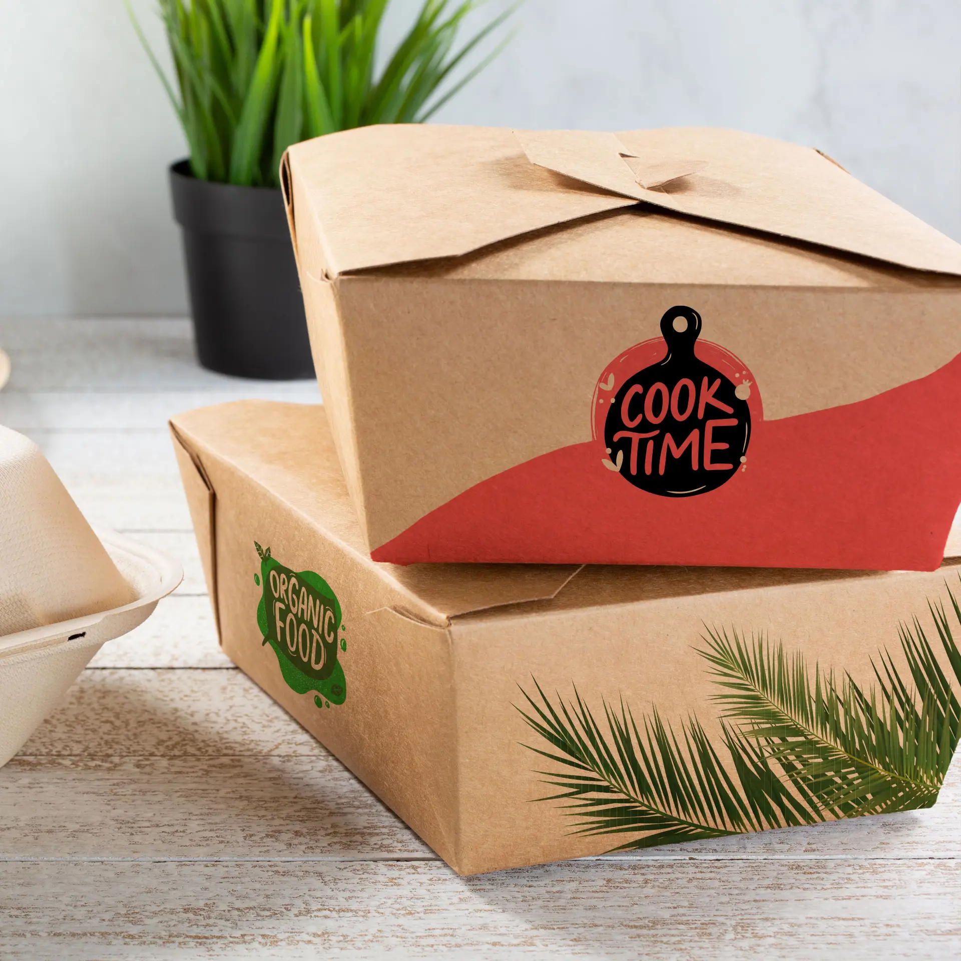 Boîtes à emporter imprimées sur mesure avec un extérieur marron ; l'une présente un graphique « COOK TIME ! », l'autre affiche « ORGANIC FOOD » avec des feuilles de palmier.