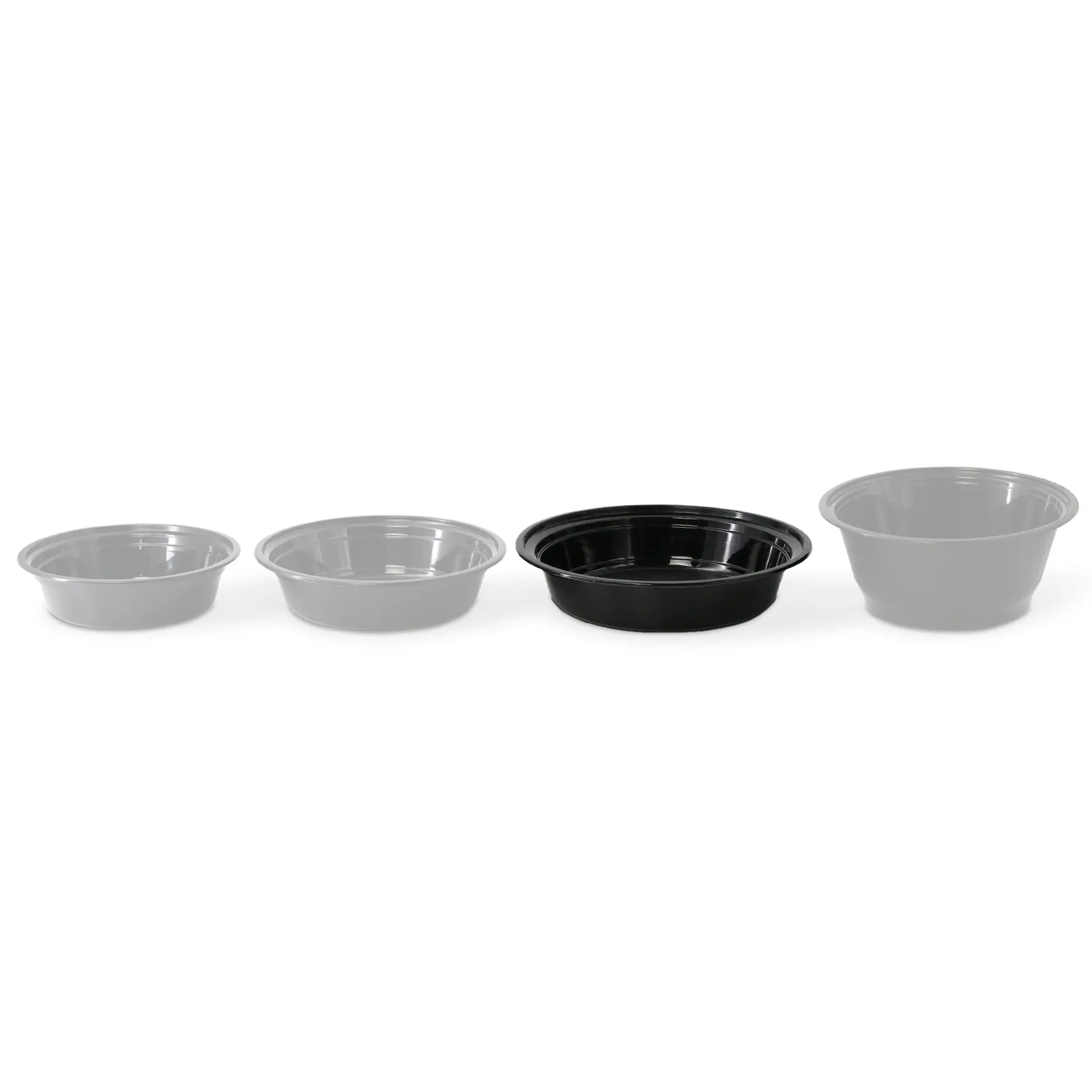 Quatre assiettes réutilisables en rang, incluant une assiette ronde noire et trois assiettes plus claires. Idéales pour des plats chauds et froids.