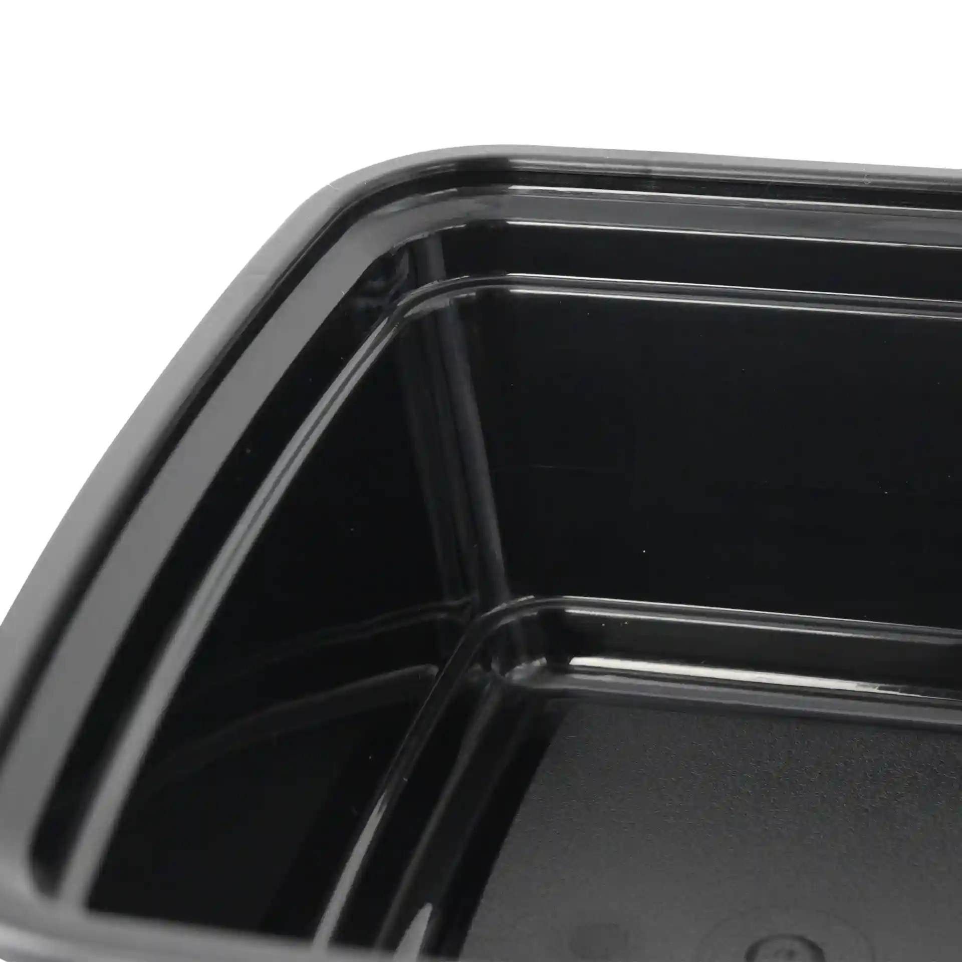 Conteneur rectangulaire réutilisable noir d'une capacité de 700 ml, montrant l'intérieur et les détails des coins.