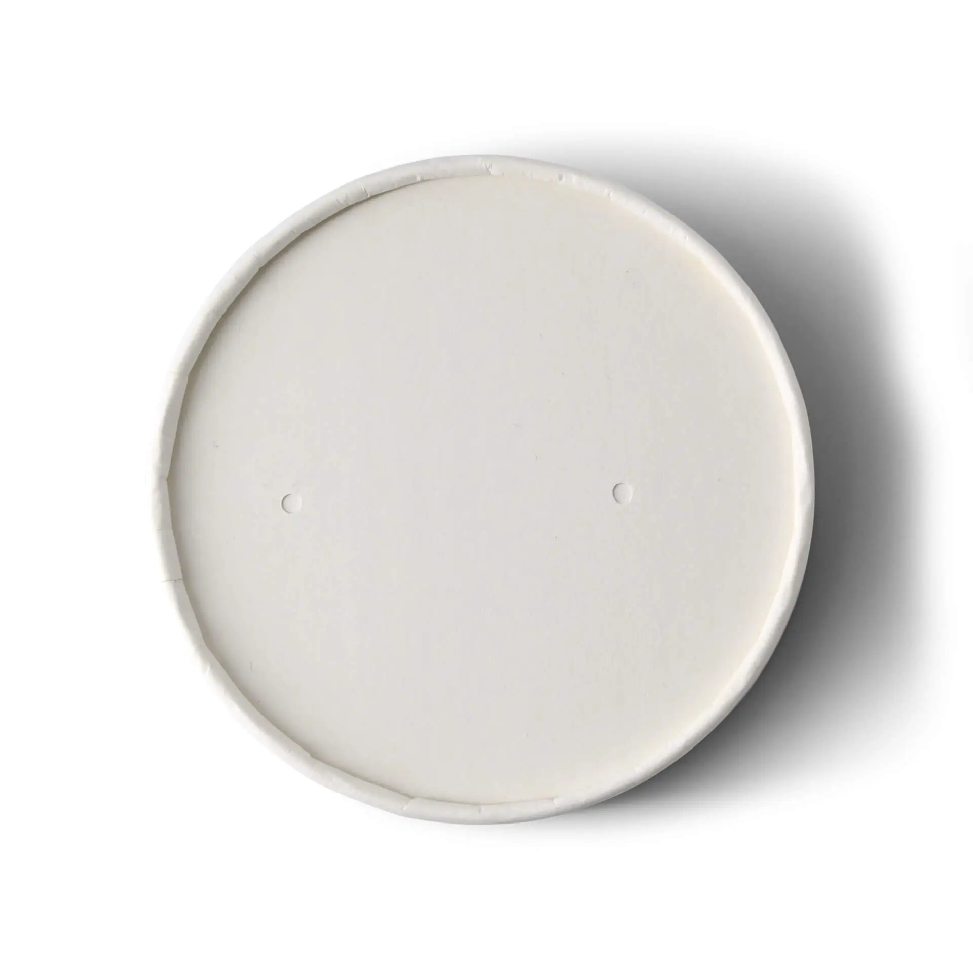 Couvercle en carton blanc d'un diamètre de 100 mm avec deux petits trous à la surface.