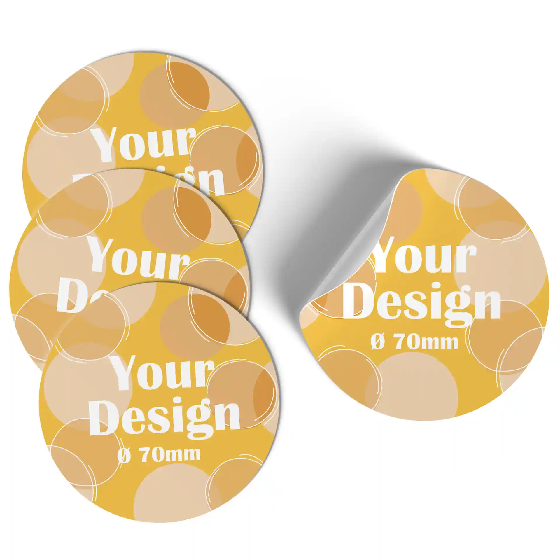 Étiquettes rondes imprimées avec des motifs jaunes et beiges, diamètre de 70 mm, avec une partie montrant un bord roulé.