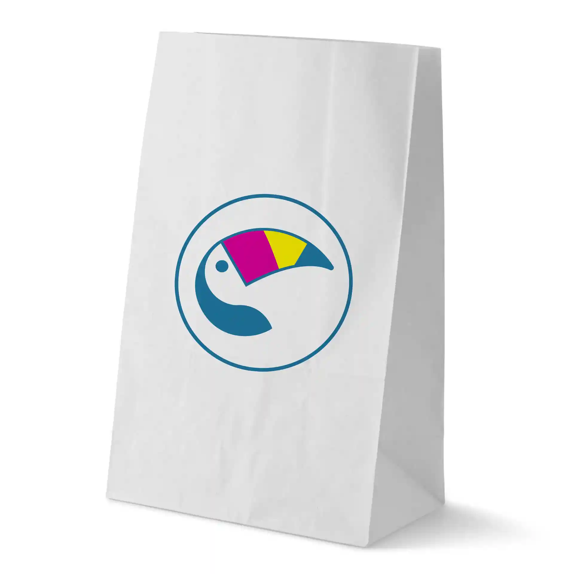 Sac en papier blanc avec un design circulaire et une illustration colorée de toucan. Dimensions : 26 x 14 x 40 cm.
