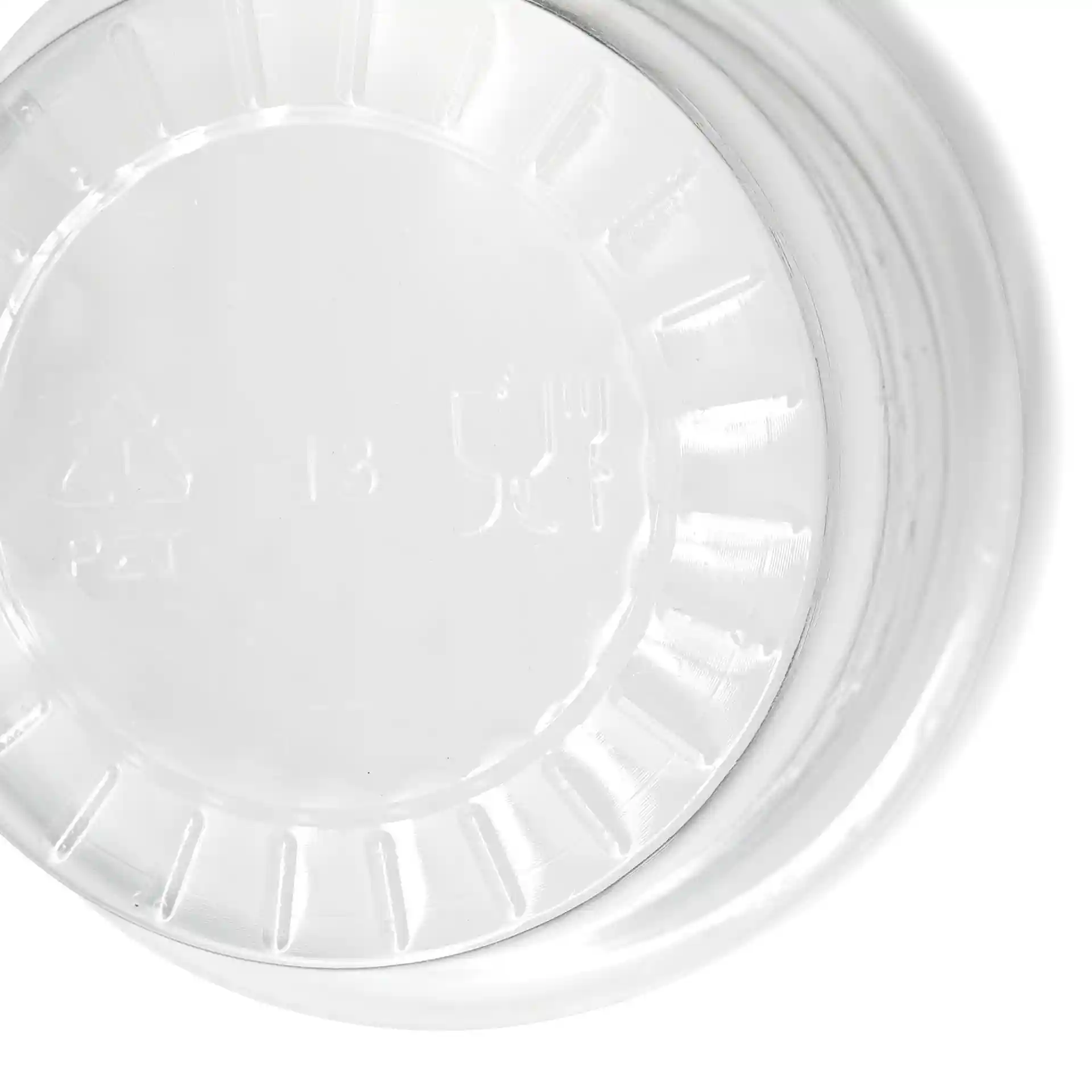 Pot à sauce en rPET transparent de forme ronde, diamètre de 75 mm, montrant le fond avec des marquages et une surface lisse.