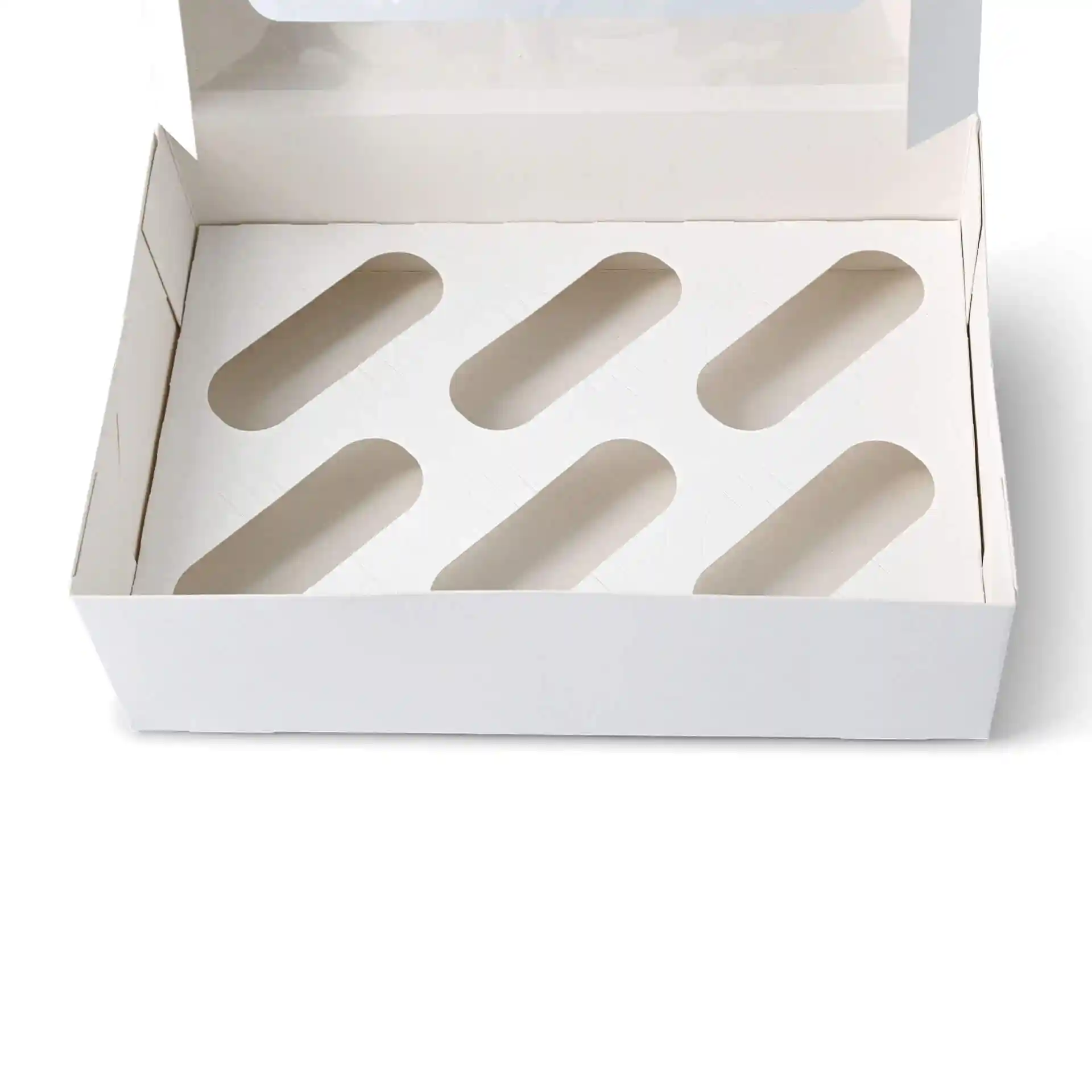 Insert de boîte à cupcakes vide avec six découpes ovales sur une base en carton blanc crème.