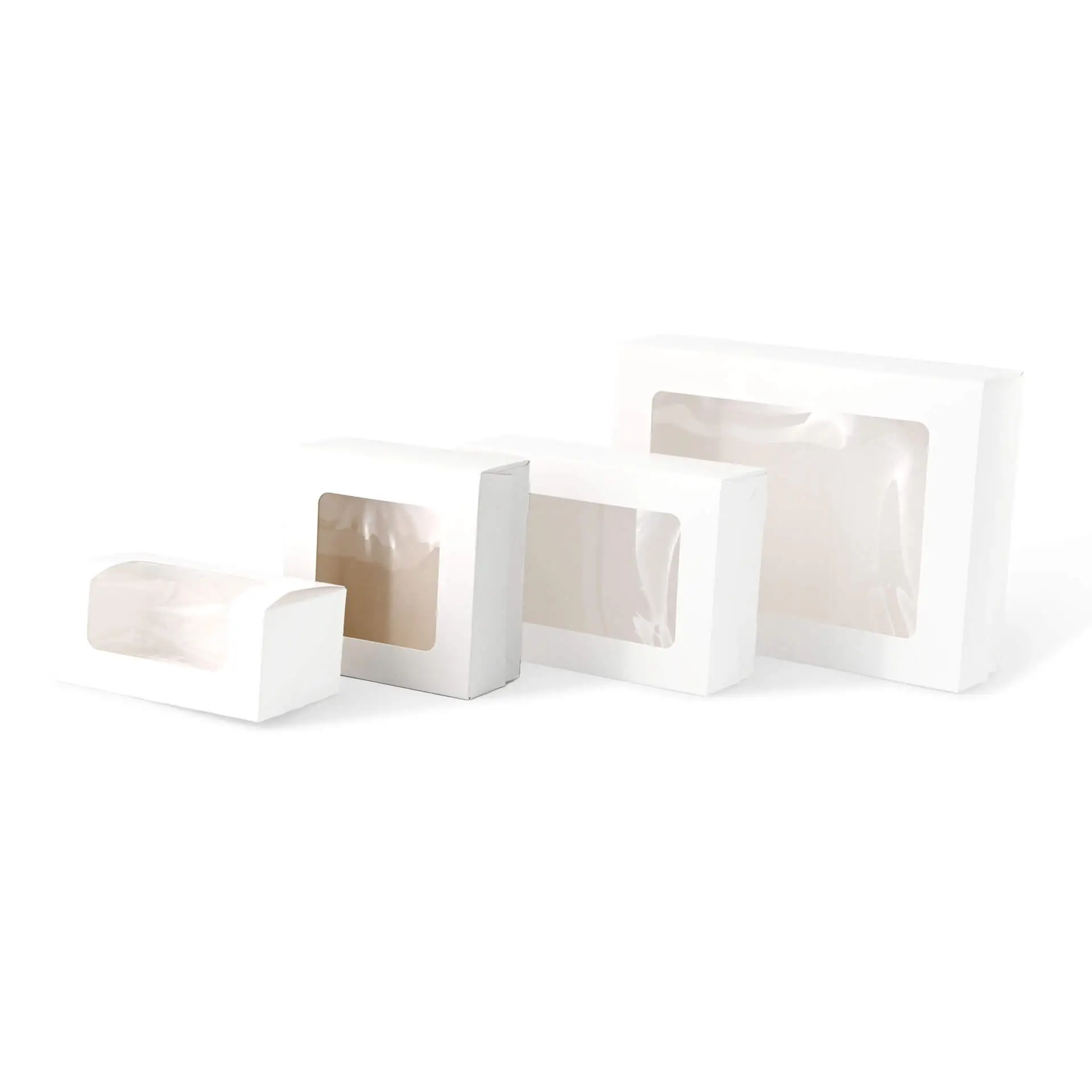 Quatre boîtes à cupcakes blanches avec fenêtres en cellulose, adaptées pour contenir des pâtisseries comme des muffins et des brownies.